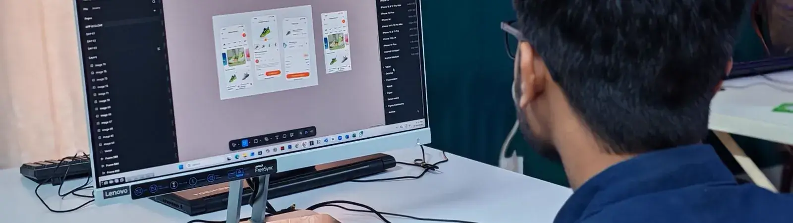 A developer building a product interface on screen