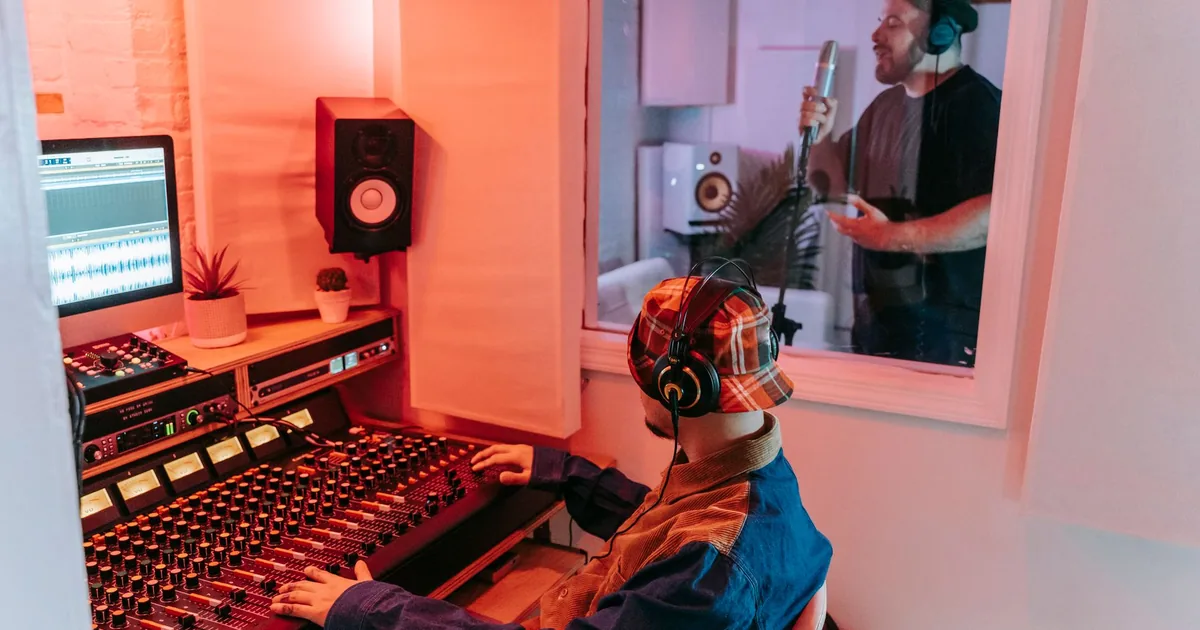 Men record voice over, showcasing modern studio & sound equipment for voice over pricing.