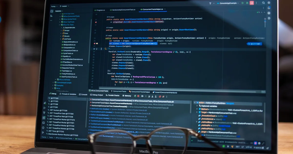 Debugging software on a laptop screen, illustrating types of localization testing.